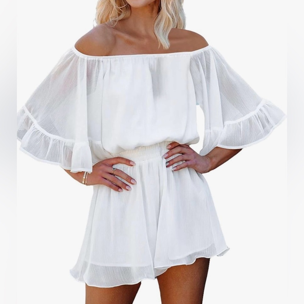 Off the shoulder romper with flared sleeve. Playful fun sexy. Light fabric